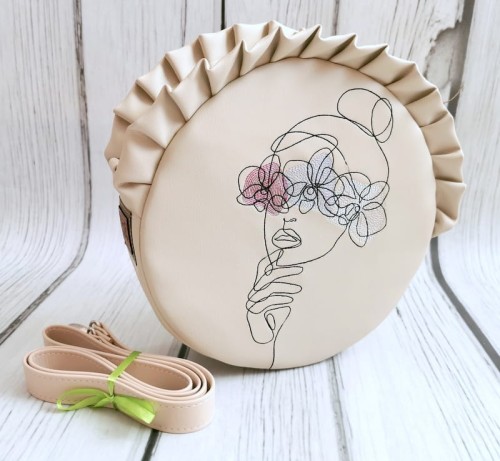 Torebka okrągła twarz kwiaty